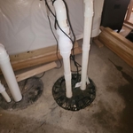 new sewer ejector pump installed in existing basem