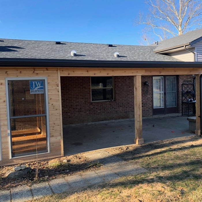 Cedar surnroom and awning, siding and roof