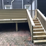 View of gate, stairs & privacy railing
