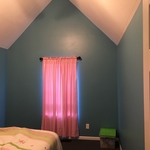 Nice blue in an above garage bedroom.