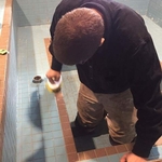Cleaning tile for a hottub