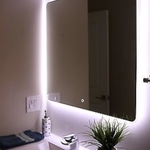 Behind your bathroom mirror is great