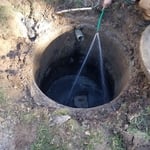 Cleaning out 500 gallon septic tank.