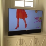 Mounted Television with Sound Bar