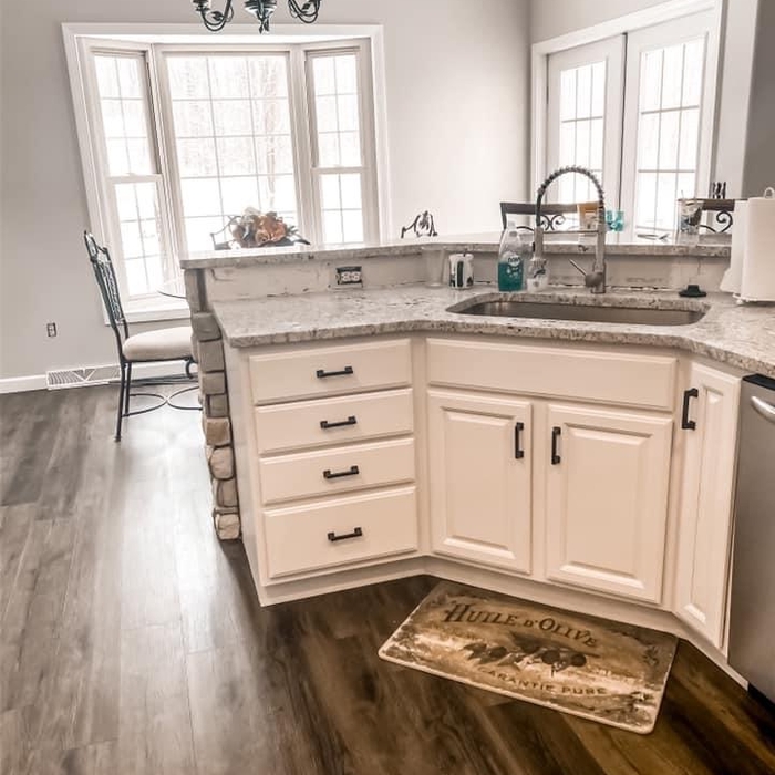 After Photo of kitchen cabinets, wallas and trim.