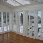 Norman Window Fashions By-Pass Shutters