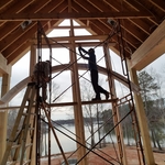 Cedar beams being installed