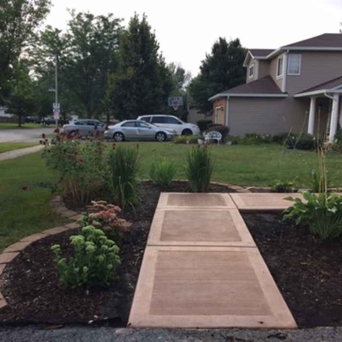 Colored concrete front walkway