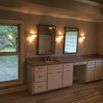 Granite countertop with vanity mirrors