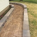 Stamped sidewal and retaining wall
