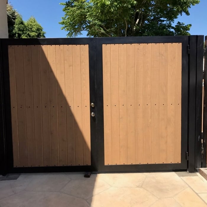 metal and wood fence and gate.