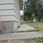 sloped towards the structure