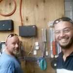 2 of our techs repairing phone system