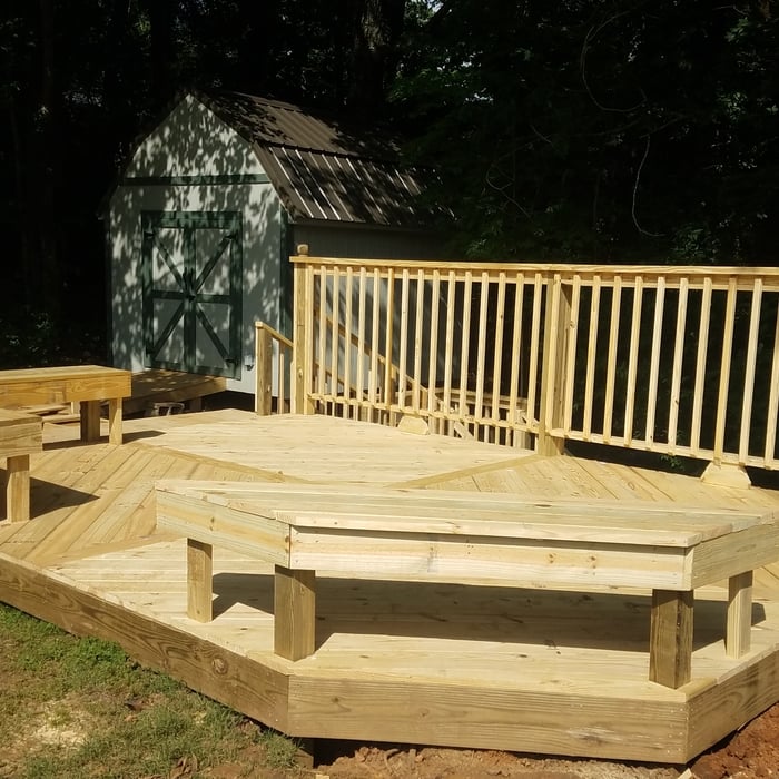 Built the deck, and work shed in the background.