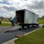 Corey carefully loading the truck