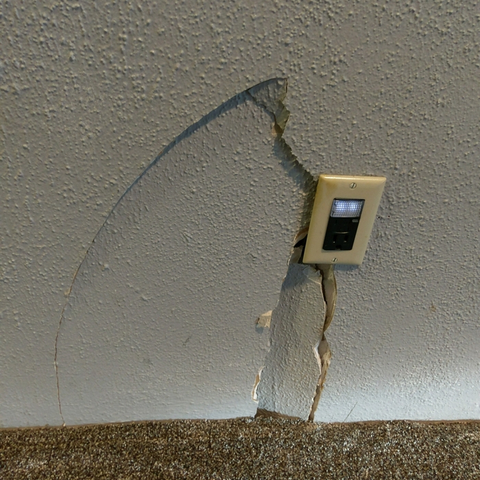 About 2 foot drywall hole