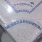 White with blue pebbles
