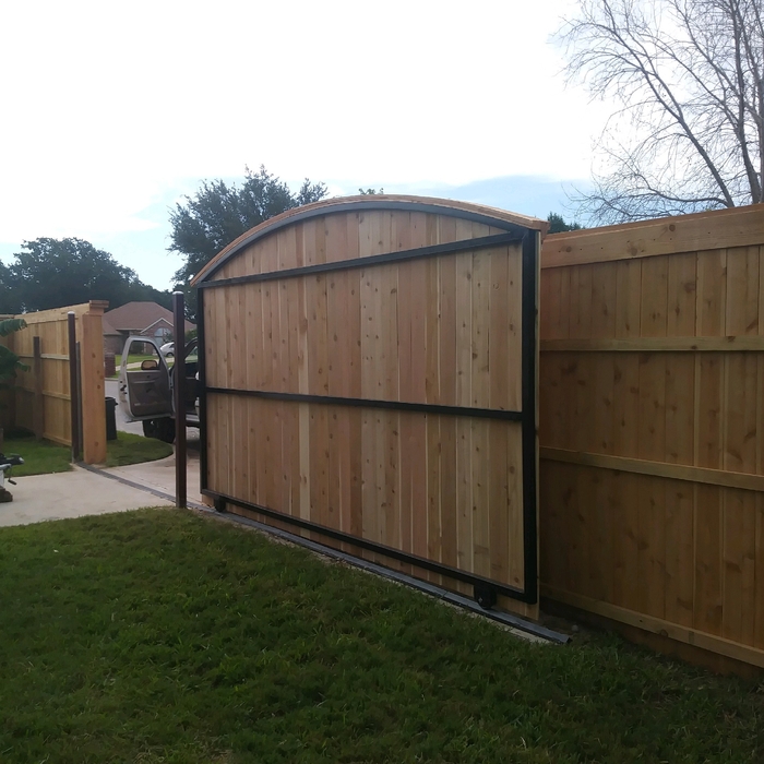 Wood fence with top rail