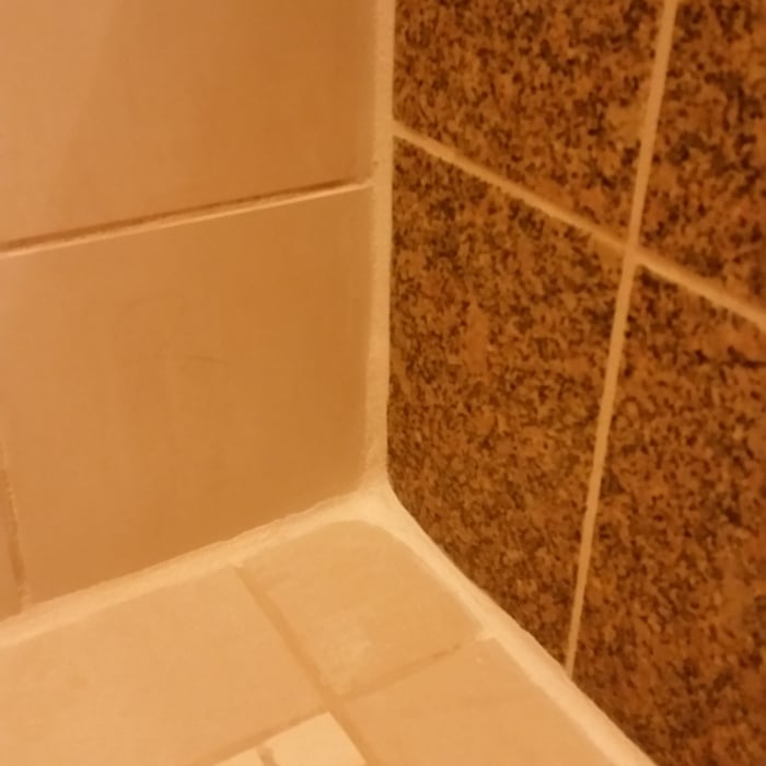 Grout repaired.