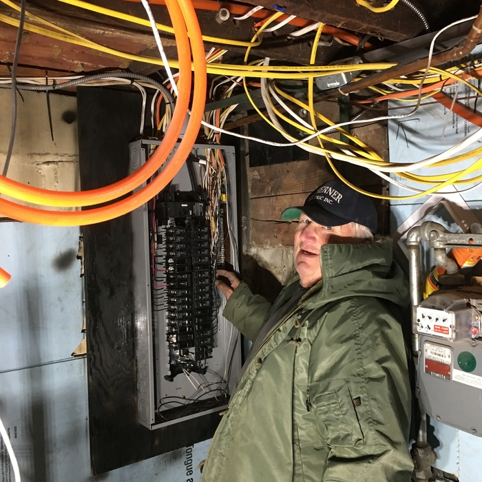 Helmut Working on the panel upgrade