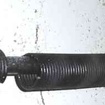 Fix broken garage door spring