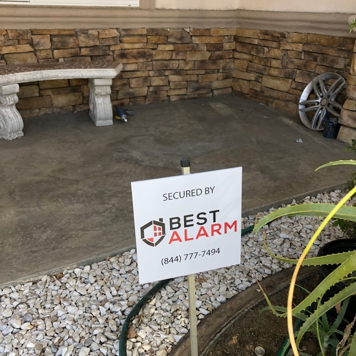 Yard sign placed near front doorway