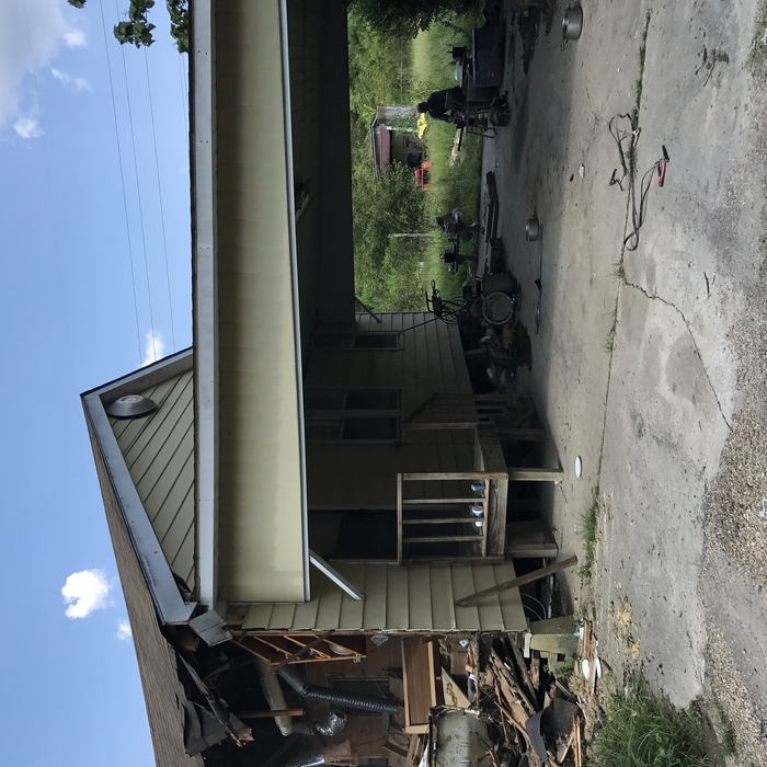 Tearing down house that flooded