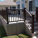 Composite deck with composite railing