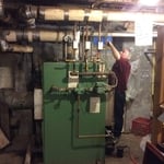 Blue Bird oil to gassteam to hot water conversion.