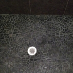 Black pebble shower floor