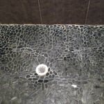 Black pebble shower floor
