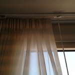 Ceiling mounted archetrac drapery rods