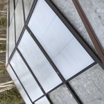 Cleaning a pool enclosure