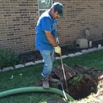 Martin pumping and cleaning a tank