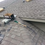 HD Shingles on top before tear off on bottom