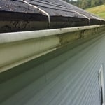 Step one of washing the face of the gutters