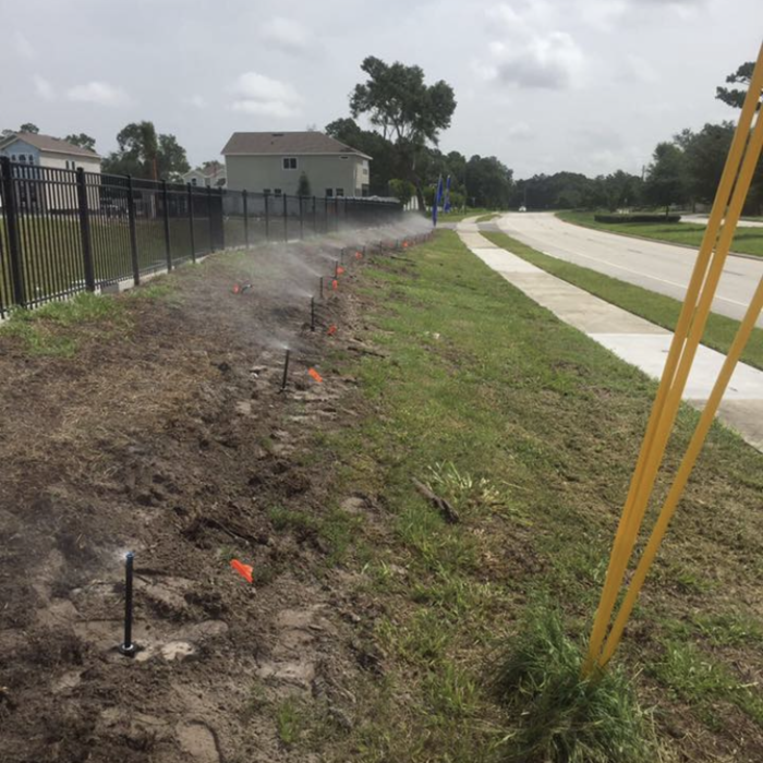 Sprinkler and grass