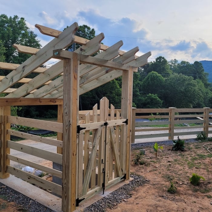 Pressure Treated cow fence with Arbor