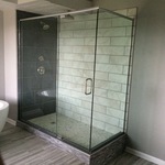 Shower door with header