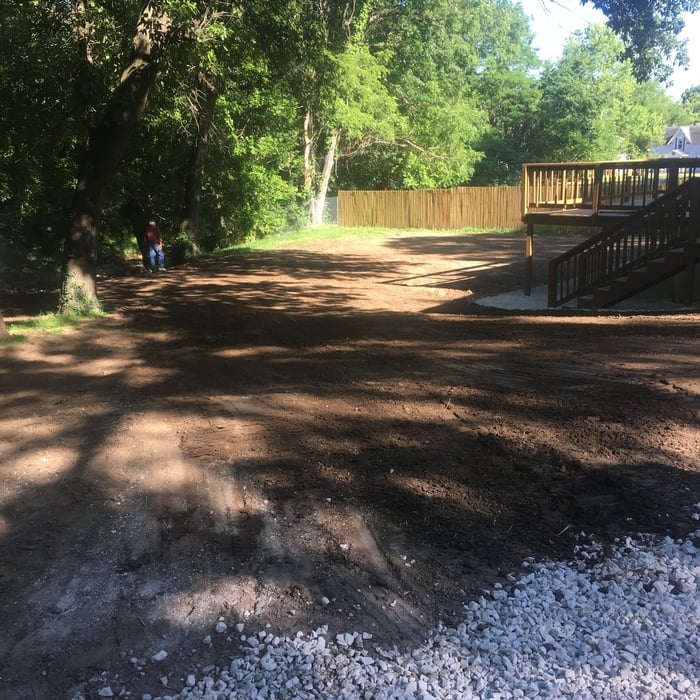 Build up yard, haul in topsoil, finish grade