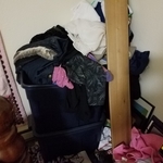 Corner of Room - boxes full of clothes