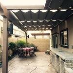 Custom patio with retractable shade cloth