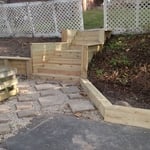 Steps with wrap around flower bed
