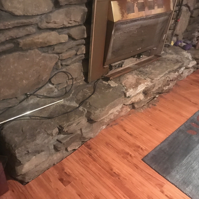 Old deteriorated hearth extension