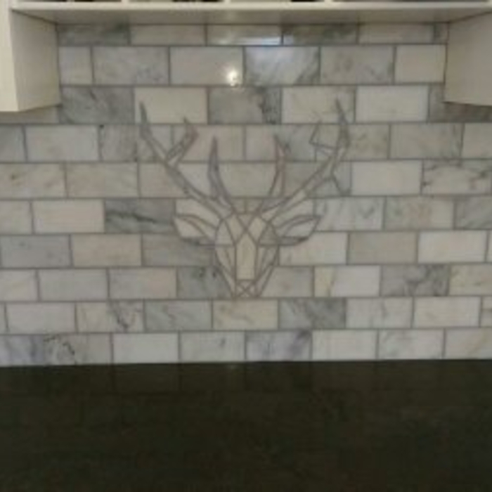 Marble Deer Mural within Backsplash