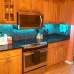 Backsplash tile and new granite counters update an