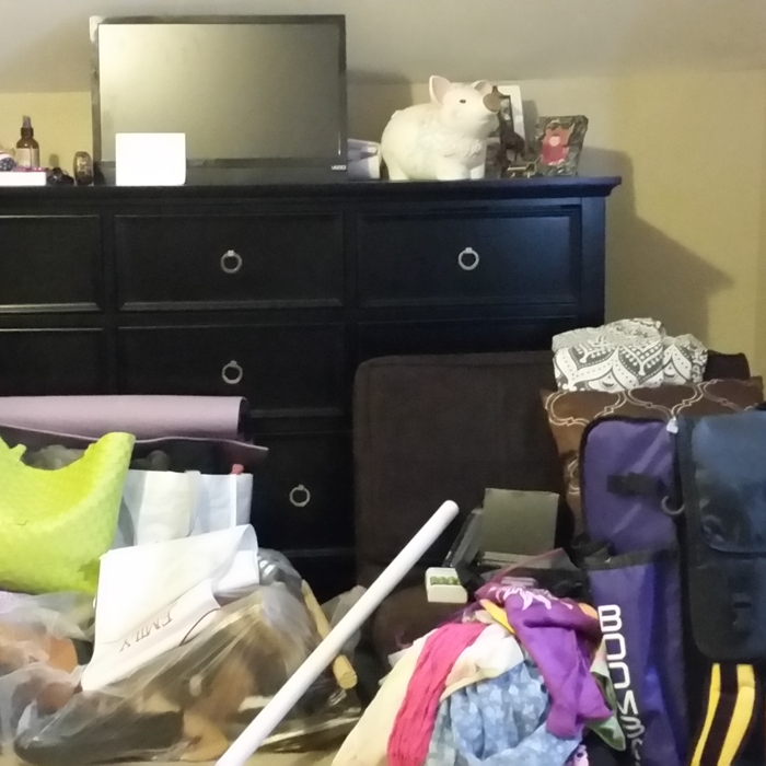 Before photo - bedroom dresser area