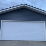 Siding soffit fascia garage wrap with coil