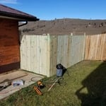 finished picket fence with hidden gate.