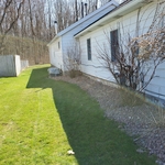 Side yard cleanup and Rock fill in